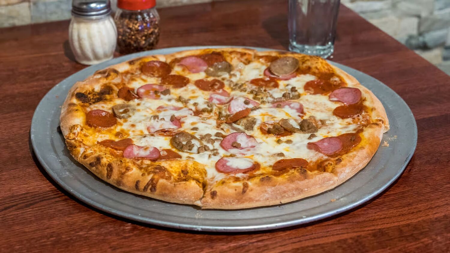 Ray's hand-tossed combination pizza with pepperoni, sausage and ham